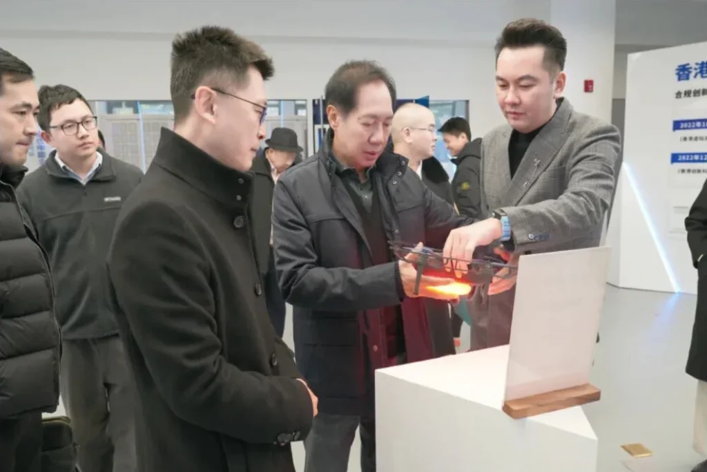 Crostars team demonstrating drone hardware to Bhokin Bhalakula Thailand delegation, Shanghai, 2025